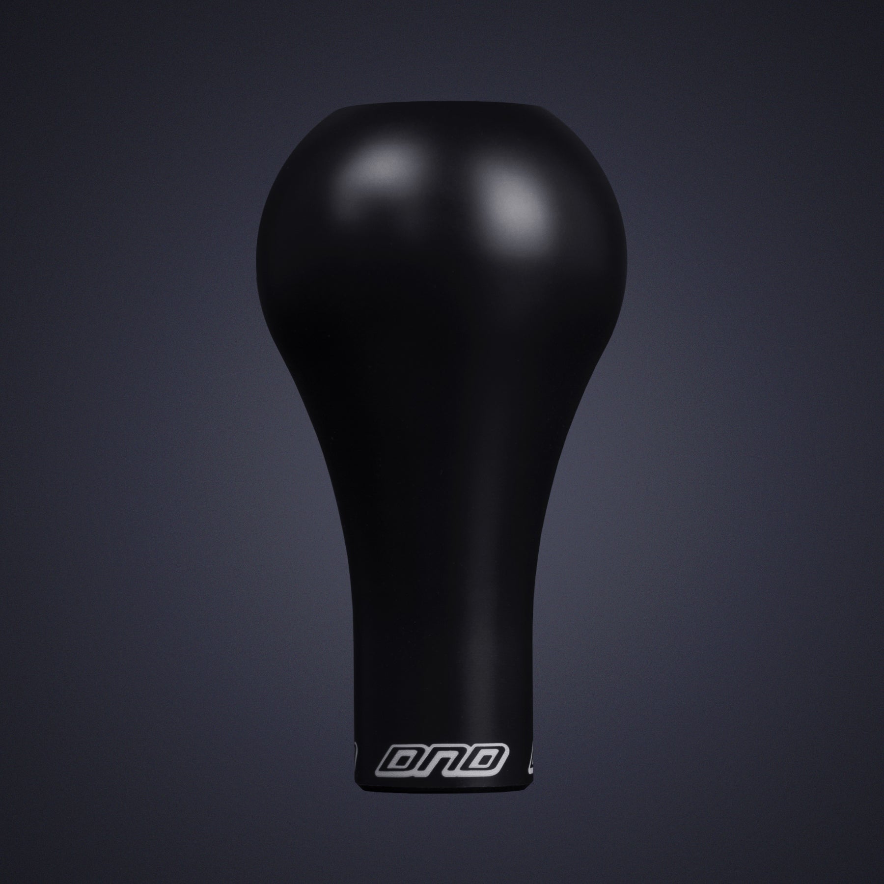 Front view of black Delrin 48R shift knob